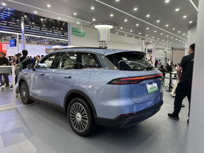 Rear and side view of electric SUV with sleek taillights and aerodynamic wheels
