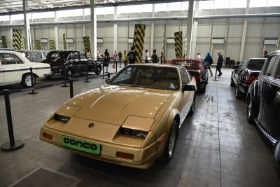 Sports coupe with pop-up headlights at car exhibition