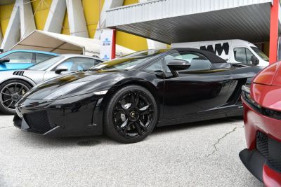 Black convertible with sporty design and black alloy wheels