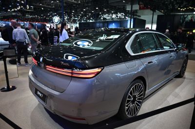 Luxury sedan rear with LED taillights and alloy wheels