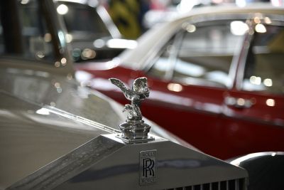 Chrome hood ornament and radiator grille detail with Rolls-Royce emblem