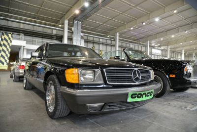 Front view with rectangular headlights and chrome-trimmed grille
