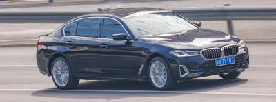 Front and side profile with alloy wheels in motion