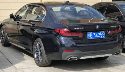 Rear and side view with tail lights and dual exhaust tips