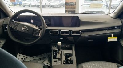 Digital dashboard and ergonomic steering wheel inside car interior