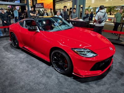 Red sports coupe with LED headlights and black alloy wheels