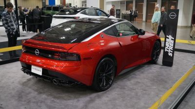 Rear and side view of a sporty coupe with sleek taillights and aerodynamic shape