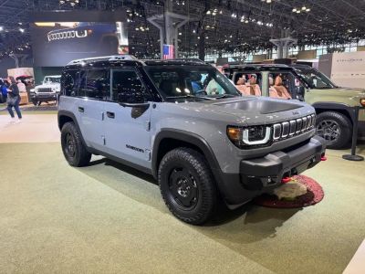 Front three-quarter view of an SUV with rugged design and distinctive grille