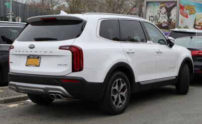 Rear view with vertical tail lights and dual exhaust tips