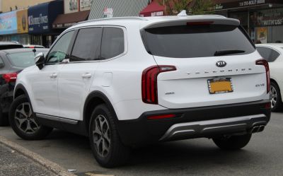 Rear view of SUV with vertical tail lights and dual exhaust tips