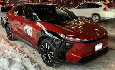 Modern electric SUV with LED headlights and black accent design