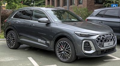 Bold front grille and sporty alloy wheels of a modern SUV