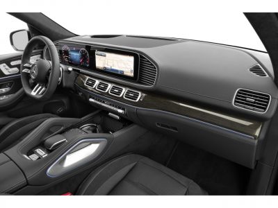 Dual digital dashboard displays and high-tech control panel in luxury car interior