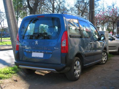 Rear view of compact MPV with large rear window and vertical taillights