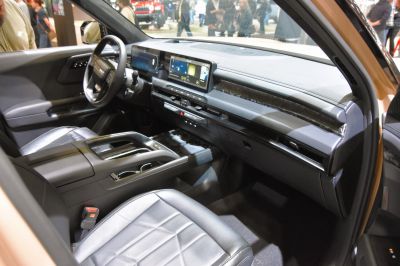 Car interior with dual digital screens and premium leather seats