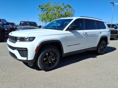 White SUV with modern headlights and black alloy wheels