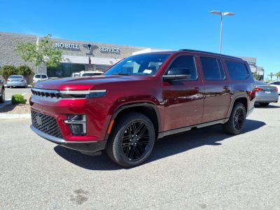 Large SUV front side view with modern grille and black alloy wheels