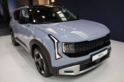 Front fascia with LED headlights and bold grille design.