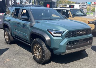 SUV with snorkel, rugged body cladding, and aggressive off-road tires