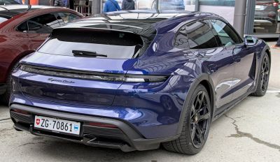 Rear and side angle with black alloy wheels and sporty design