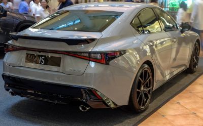 Sleek rear design with continuous LED tail light strip and sporty dual exhaust