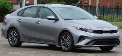 Modern front grille and aerodynamic side profile with alloy wheels