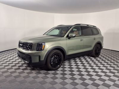 Facelifted SUV with updated grille, LED headlights, and black wheels