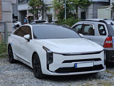 Front view with vertical LED headlights and sleek aerodynamic design