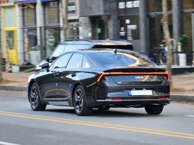 Sleek rear and side view with modern tail lights and aerodynamic shape