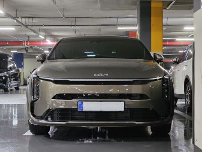 Sleek front end with distinctive LED headlights and modern grille.