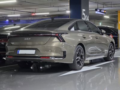 Rear view of a sedan with sharp LED taillights and modern alloy wheels