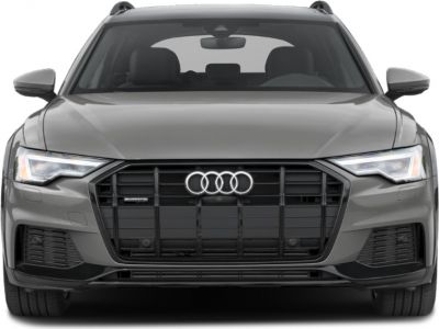 Front view of a luxury SUV with LED headlights and distinctive grille