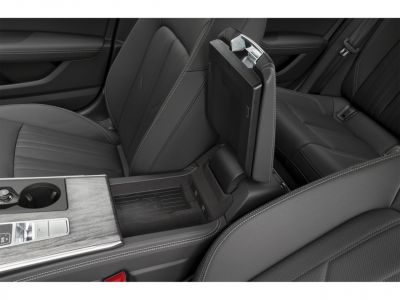 Close-up interior center console and armrest with storage compartment