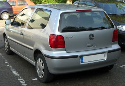 Rear view of a silver 3-door hatchback with distinctive taillights and rear wiper