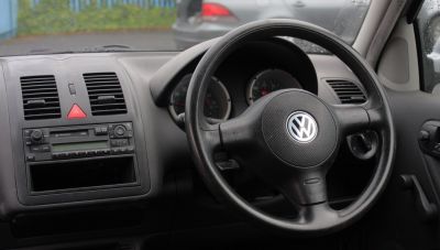 Dashboard and steering wheel with classic radio and instrument cluster