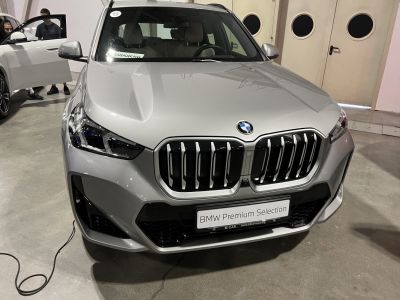 Front end showing kidney grille and headlights of modern SUV