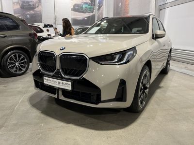 Large kidney grille and sleek LED headlights on modern SUV front