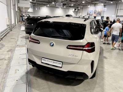 Rear view with sleek tail lights and sporty bumper