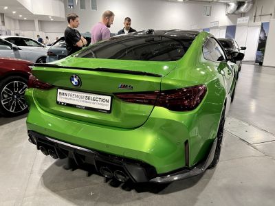 Rear view with quad exhaust and diffuser of a sporty coupe