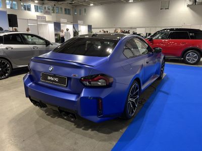 Rear view, quad exhaust, sporty coupe, matte blue finish