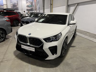 White compact SUV with dual kidney grille and LED headlights