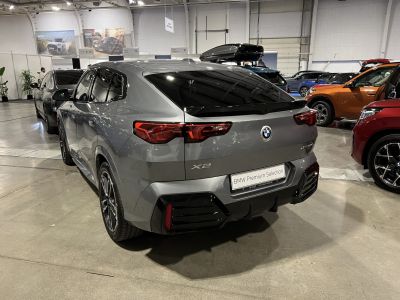 Rear view of a compact crossover SUV with LED tail lights and sporty rear design.