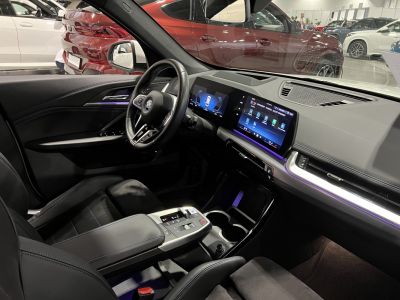 Modern digital dashboard and touchscreen infotainment with premium steering wheel