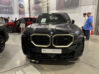 Front view with signature dual kidney grille and aggressive hood design