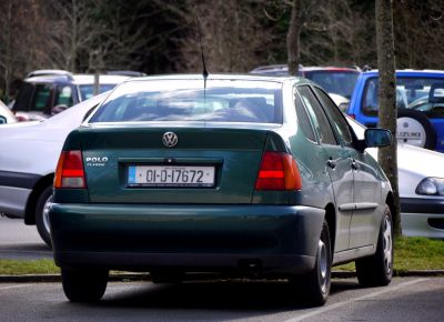 Rear view of hatchback with distinct taillights and rear design.