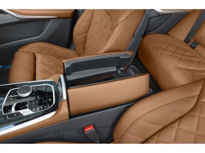 Brown quilted leather seats with advanced central console control
