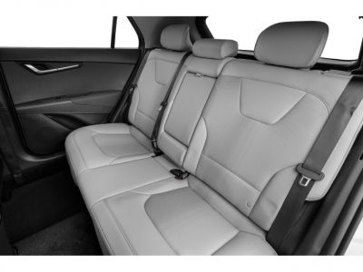 Spacious rear seat with premium upholstery and seat belts