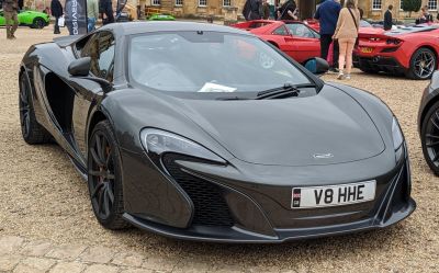 Aerodynamic front fascia with LED headlights and large side air intakes
