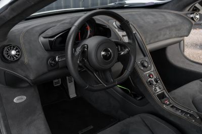 Carbon fiber steering wheel and Alcantara dashboard with stitched detail