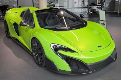 Convertible sports car with aerodynamic front and open roof